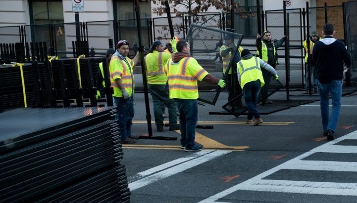 Fences go up as part of the security operation to protect the inauguration. AFP