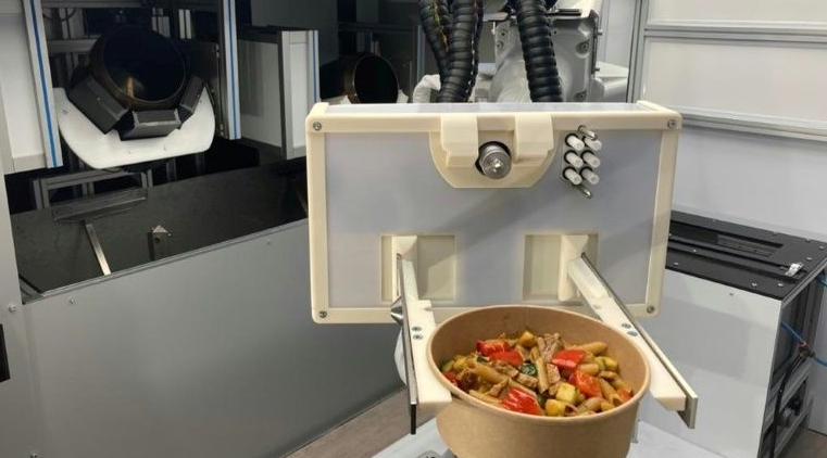 An automated kitched developed by the startup RoboEatz and launching at the 2021 Consumer Electronics Show prepares, cooks and serves an array of hot and cold food dishes from soups to salads to meal bowls. AFP