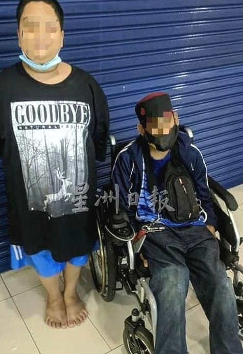 The barefoot teenager and his wheelchair-bound uncle sell snacks at the mall. SIN CHEW DAILY