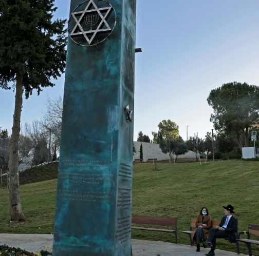 An ultra-orthodox Jewish man and a woman chat in Jerusalem. AFP