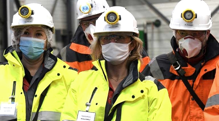 French environment minister Barbara Pompili (C) visits the site. AFP