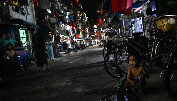 People taking part in a noise campaign in Yangon, Myanmar, following calls for protest against the military coup on the social media. AFP