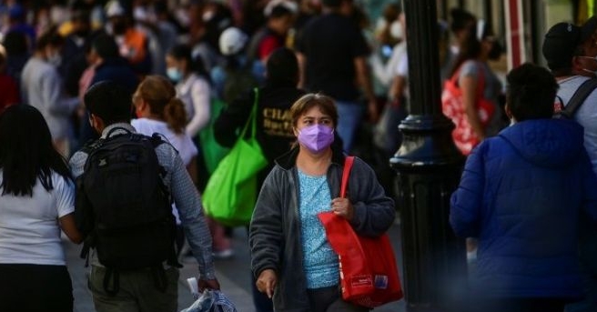 Crowds still gather in the streets and on public transport in Mexico City despite an official halt to most non-essential activities. AFP