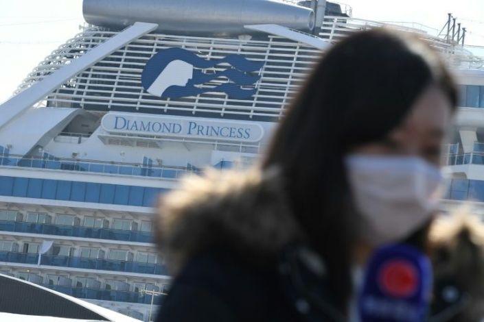 Over 700 people on board the Diamond Princess ultimately tested positive for coronavirus, and 13 died. AFP