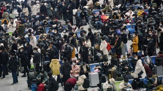 People wait to board trains at Hangzhou East Railway Station in eastern China's Zhejiang province. AFP People wait to board trains at Hangzhou East Railway Station in eastern China's Zhejiang province. AFP