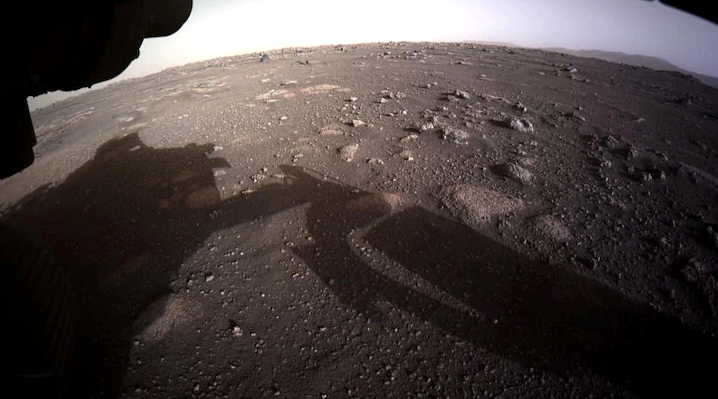 The first high-resolution, color image to be sent back by the Hazard Cameras (Hazcams) on the underside of Nasa's Perseverance Mars rover is seen after its landing on Mars. NASA