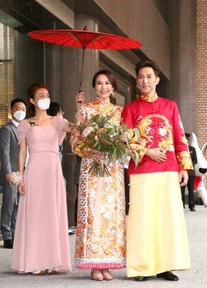 汤怡与麦秋成在今日元宵佳节结婚，于阳明山庄举行婚礼。