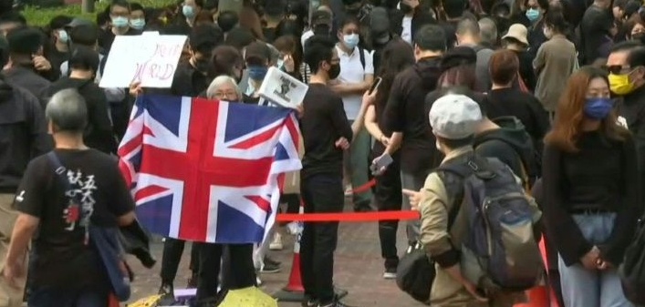 'Grandma Wong' leads brief reminder of Hong Kong's protest past. AFP 'Grandma Wong' leads brief reminder of Hong Kong's protest past. AFP