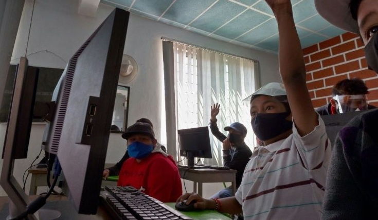 After the pandemic closed their school, these students living in a poor neighborhood near the Mexican capital have been taught how to use computers for the first time. AFP
