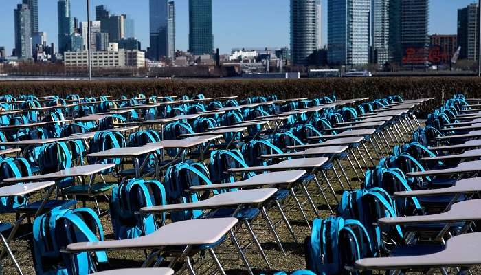 School desks are set up outside the UN Headquarters in New York City as part of the UNICEF 