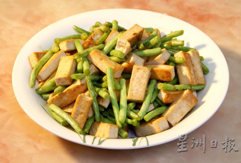 四季豆炒豆干是丽萍家餐桌上的常客。