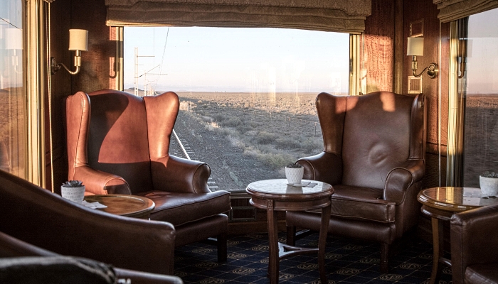 The semi-desert landscape of the Karoo area seen early morning from the observation car at the back of the Blue Train. AFP