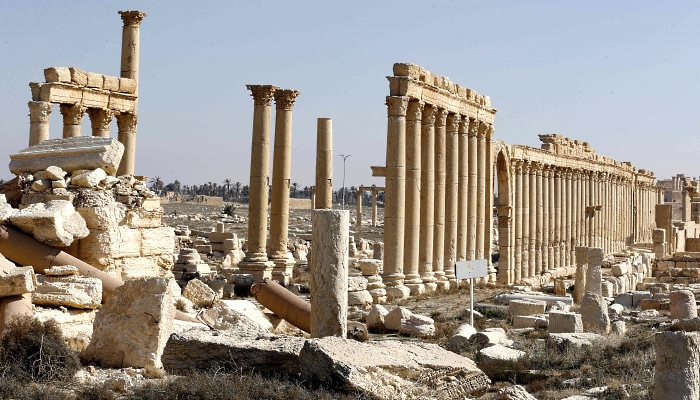 The damaged Arch of Triumph and surrounding columns in Palmyra. AFP