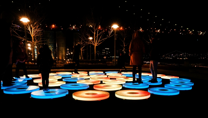 People walk on a new public art installation 