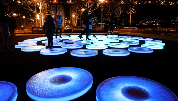 People walk on a new public art installation 