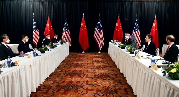 Antony Blinken (R2) speaks while facing top Chinese foreign affairs official Yang Jiechi (L2), at the opening session of US-China talks in Anchorage.