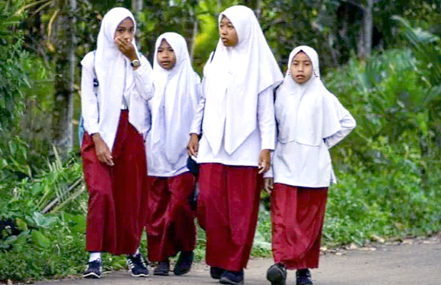 Schools across Indonesia have long used a combination of psychological pressure, public humiliation and sanctions to persuade girls to wear hijab. AFP