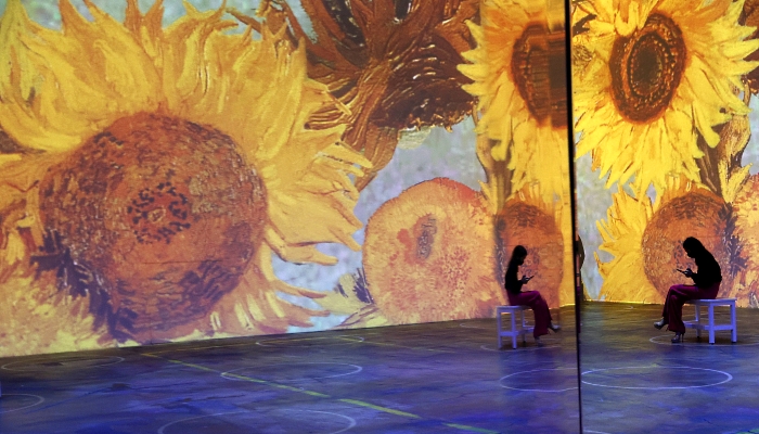 Guests view the Immersive Van Gogh exhibit during a media preview at SVN West in San Francisco, California. AFP