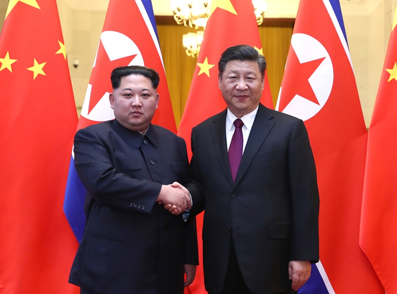 图为习近平与金正恩2018年在北京举行会晤。（图：新华社）