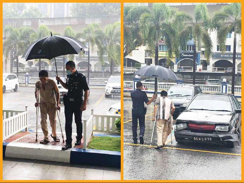 法依鲁伍长细心为前来警局处理事务的老翁撑伞，过程被民众摄下，并上传至脸书，吸引网民关注和赞赏。