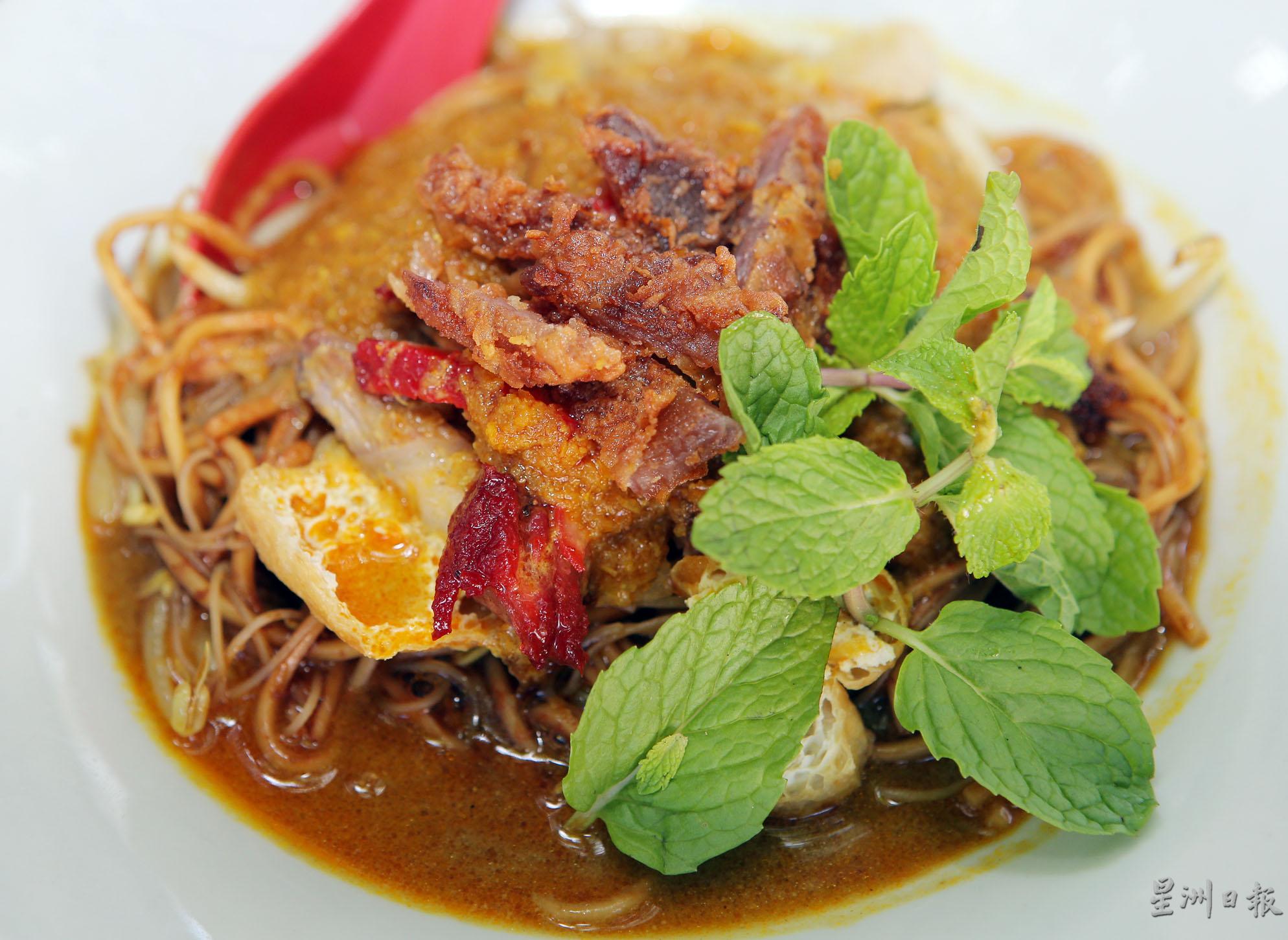 酸中带辣的惹味海南咖喱，是嗜吃重口味者的美食口袋名单之一。图为干咖喱的口味。