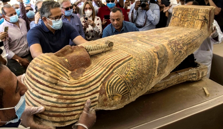 The opening of a sarcophagus excavated by the Egyptian archaeological mission at the Saqqara necropolis near Cairo. AFP