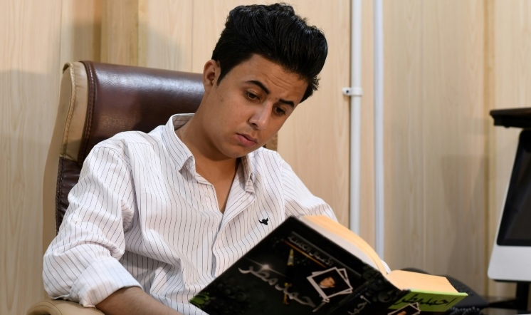 Hussein, a young Iraqi activist born in 2000, never experienced the brutality of Saddam Hussein's regime. AFP