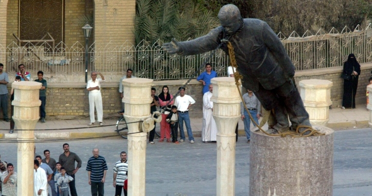 American promises of freedom and democracy ring hollow in Iraq 18 years after US troops seized Baghdad, and toppled a statue of Saddam Hussein. AFP