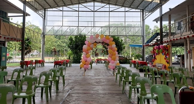 Chairs are placed one meter apart at the venue of Puspa's farewell ceremony.