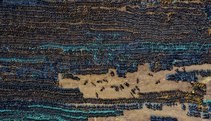 Aerial photo showing abandoned public shared bicycles at a lot in Shenyang in China's northeastern Liaoning province. AFP