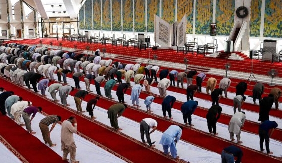 Muslims offer a prayer at the Grand Faisal Mosque in Islamabad. AFP