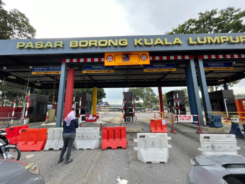 吉隆坡市政局已封锁吉隆坡批发公市的出入口，禁止任何人进入。（辛建佳提供）

