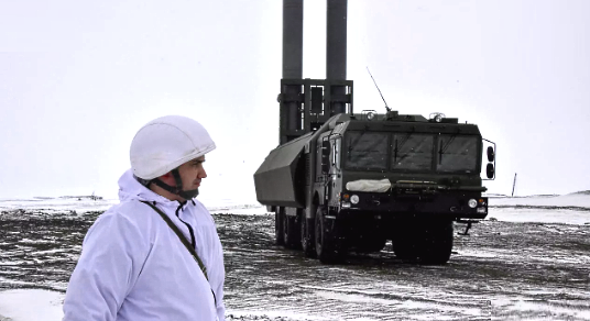 A serviceman stands near a Russia's Bastion mobile coastal defence missile system on the island of Alexandra Land, which is part of the Franz Josef Land archipelago. AFP