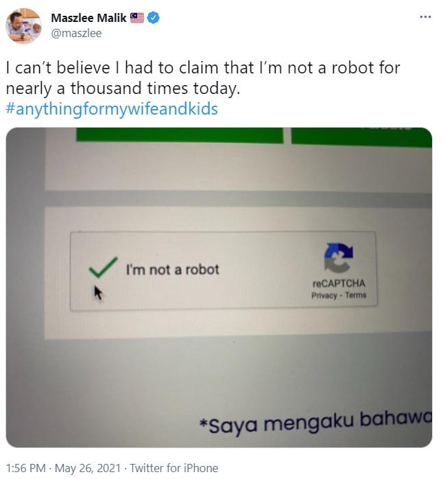 马智礼在推特指卡在验证处，被逼不断点击“我不是机器人”的框框。
