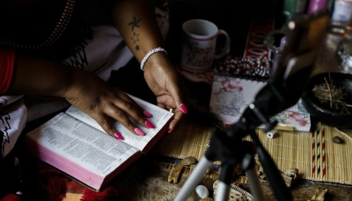 South African sangomas offer services including dream interpretations using tools like the Bible. AFP