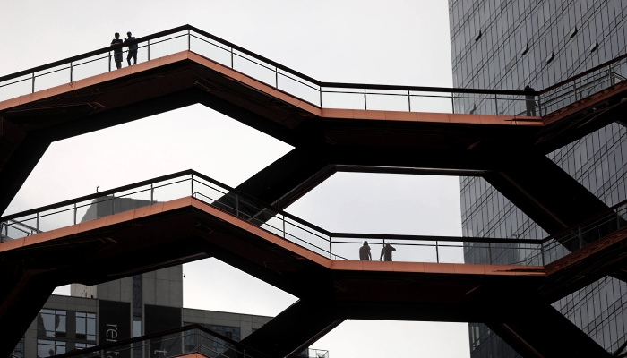 The Vessel, a 150-foot modernist structure in Hudson Yards, New York City, has reopened with a ban on solo visitors following a series of suicides. AFP
