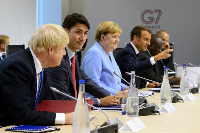 （左起）英国首相约翰逊、加拿大总理杜鲁多、德国总理默克尔和法国总统马克龙被视为是拜登在七国集团的重点合作对象。（美联社照片）