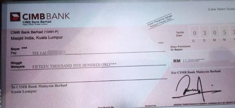 假银行代理发送给郑丽亮的伪造支票，好令她相信1万5500令吉的汇款已批准，使得她愿意支付“手续费”。
