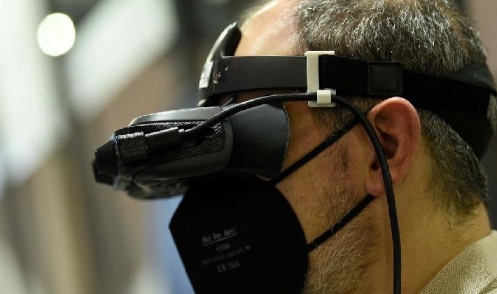 A man uses Biel Digital glasses at the MWC fair in Barcelona. AFP