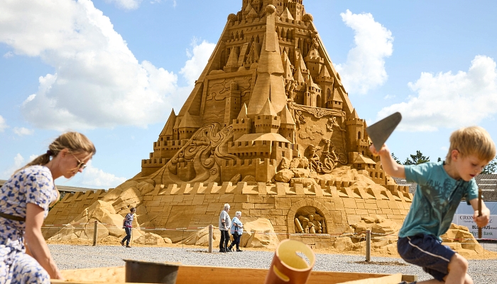 The world's tallest sand sculpture under construction in the small seaside town of Blokhus in Denmark. AFP