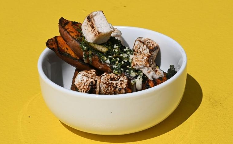 This dish featuring roasted sweet potato with collard furikake, sesame seed butter and caramelized anise spiced marshmallow is just one of numerous American culinary treats that trace their origins back to Africa. AFP