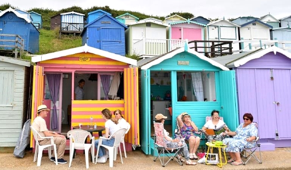 In the eastern English resort of Walton-on-the-Naze, beach huts run along the shore for miles. AFP