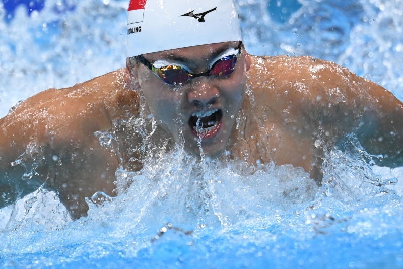 狮城泳手约瑟林周四参加东奥百米蝶泳预赛。（图：法新社）