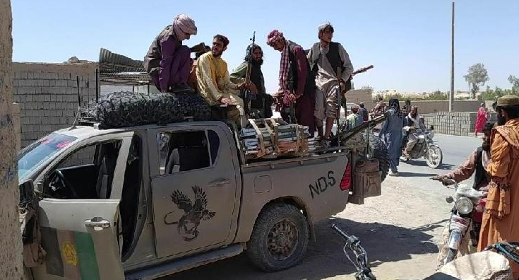 Members of the Taliban patrol the Afghan city of Farah in the country's west. AFP