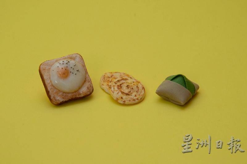 马来西亚特色早餐,如椰浆饭、印度煎饼和煎蛋面包,也成陈祖儿的微缩模型作品。